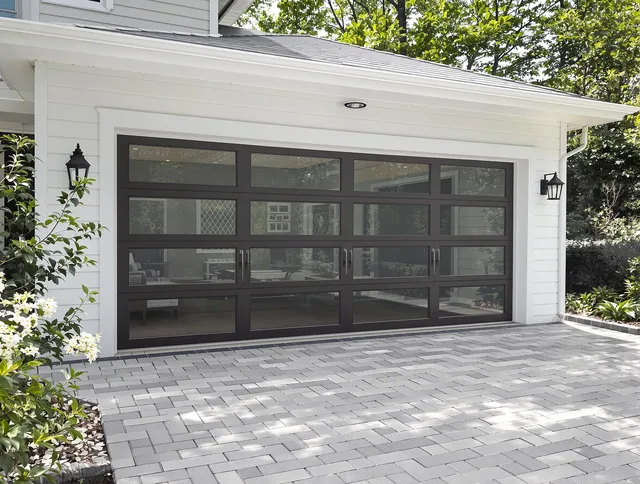 Solon Garage Door Repair design specialist presenting custom garage door options to Solon homeowner