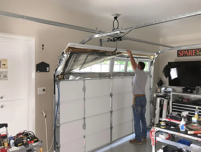 Garage door section replacement by Solon Garage Door Repair in Solon