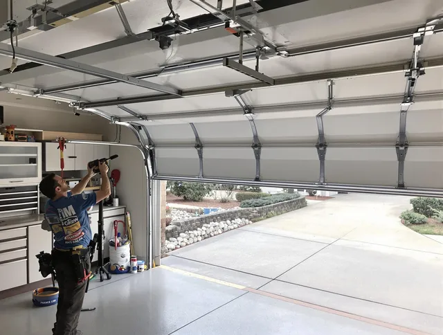Garage door track repair service by Solon Garage Door Repair in Solon